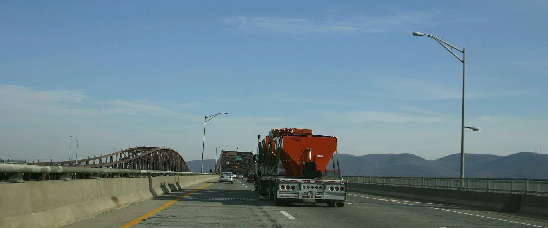 Used step deck trailer buyer — MachineryBarn pays cash for drop deck trailers